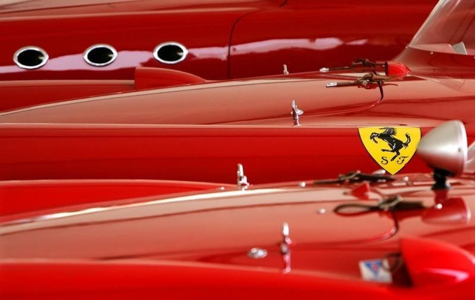 816323-ferrari-cars-are-parked-in-a-box-before-the-start-of-the-sotheby-s-at-ferrari-auction-in-maranello